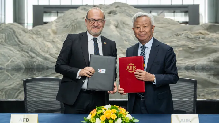 Remy Rioux CEO of AFD and Jin Liqun, AIIB President and Chair of the Board.